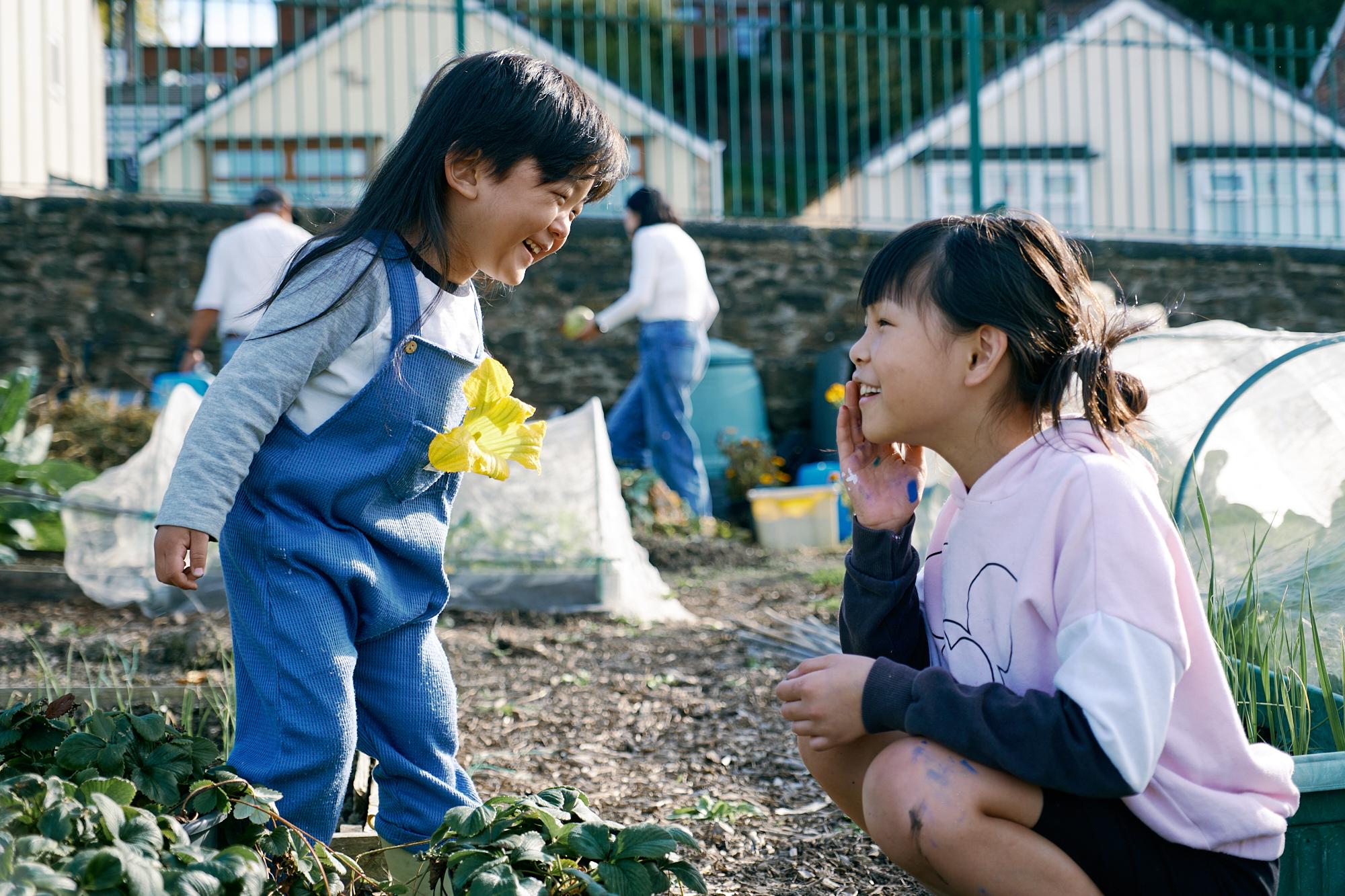 Girls at a community allotment
