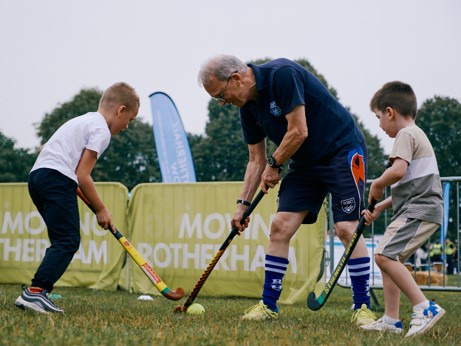People playing hockey.