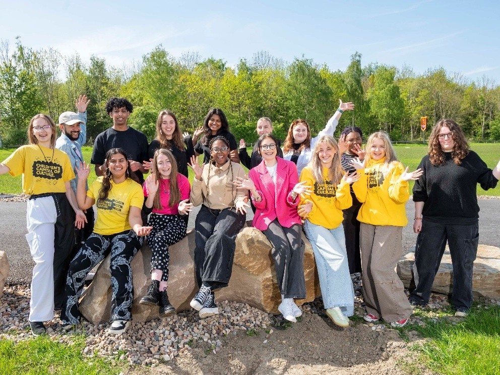 A group of people pose for the camera