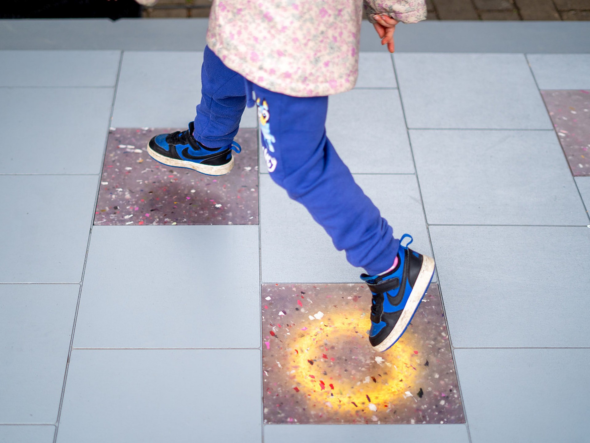 Coloured floor tiles.