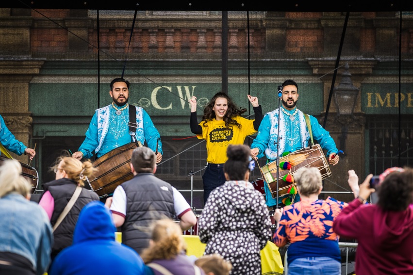 Performers on stage at ROOT.