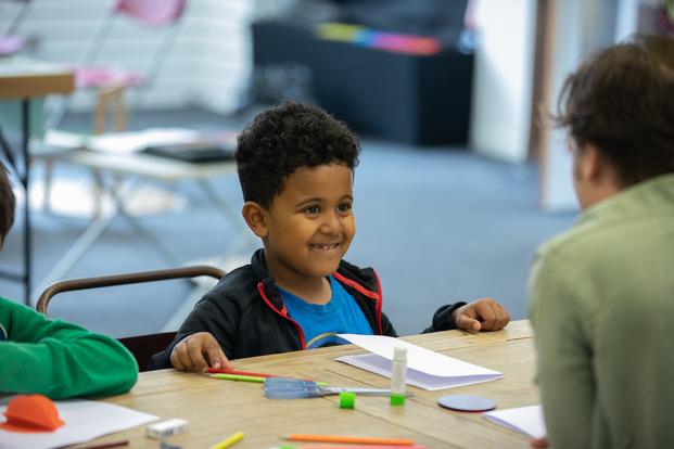 Say hello. Smiling boy. Photo credit Andy Brown 1