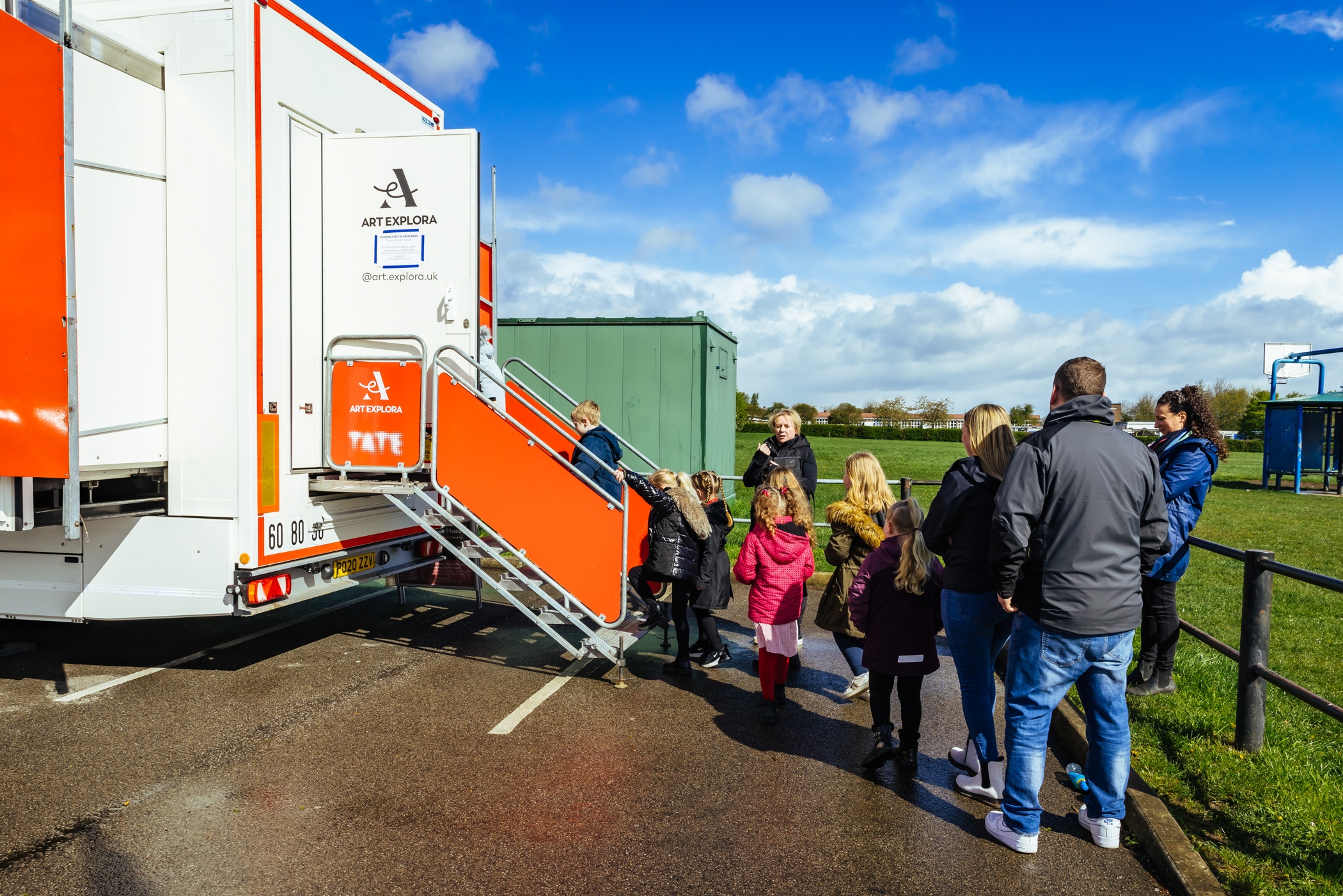 People visiting the Art Explora Mobile Museum